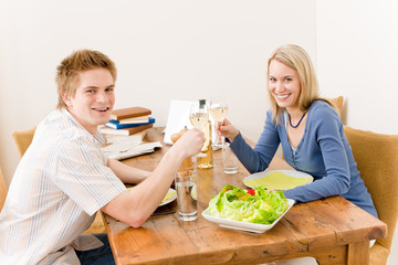 Happy couple enjoy wine eat fit salad