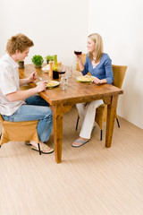 Dinner romantic couple enjoy wine eat pasta