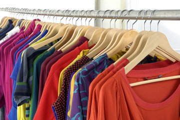 colorful shirt rack on white