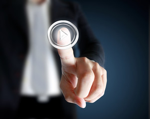 hand pushing on a touch screen interface