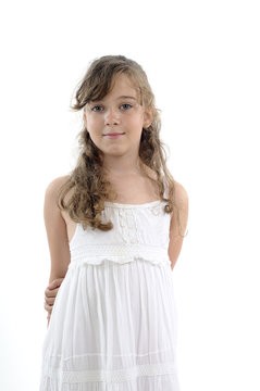 elegant girl posing in white dress