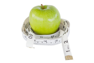 Green apple circled with a tape measure