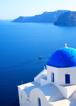 Fototapeta Traditional village of Thira at Santorini island in Greece