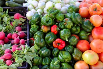 Fototapeta na wymiar greengrocers radish tomatoes green red peppers