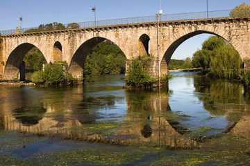 Fototapeta premium Bridge of Ponte da Barca, ancient portuguese village, on Minho r