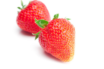 big juicy red ripe strawberries  isolated on white