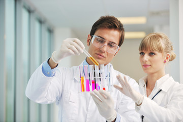 science people in bright lab