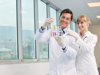science people in bright lab