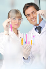 science people in bright lab