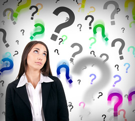businesswoman with question marks