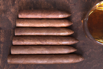 Cigars, Whiskey on a dark background