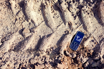 cell phone on tread