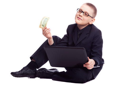 boy with laptop and money