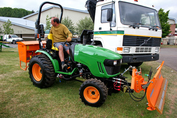 man driving tractor