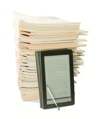 Electronic book with a stack of old newspapers behind