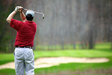 A man enjoying a game of golf
