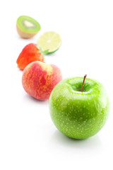 big juicy red ripe strawberries,apple,lime,peach and kiwi  isola