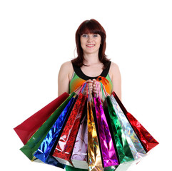 Beautiful happy woman with shopping bags