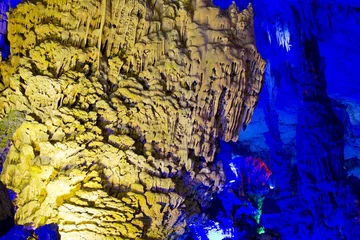 Foto op Canvas The illuminated Reed Flute Caves in Guilin, China © TravelWorld