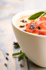 fresh melon soup with parma ham and lavender flower