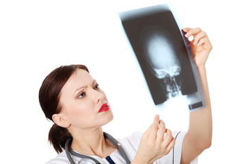 Doctor looking at x-ray