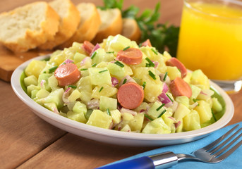 Fresh potato salad with sausage slices