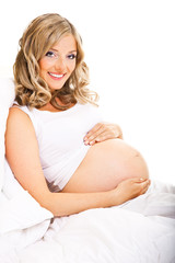 Pregnant woman isolated on white