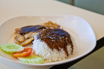grilled chicken, rice with teriyaki sauce and tomato