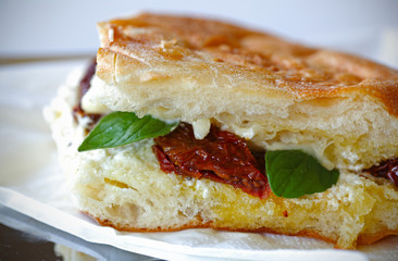 Grilled sandwich with fresh cheese and sun dried tomatoes