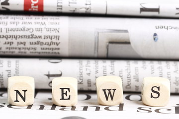 NEWS vor Zeitungen