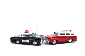 Obraz na płótnie Canvas toy car crash, A police car and a red car accident display.