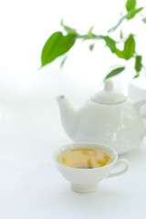 Obraz na płótnie Canvas White cup with tea