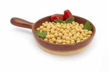 Close up view of chickpea in bowl on white background