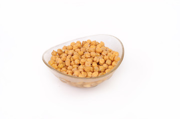 Close up view of chickpea in bowl on white background