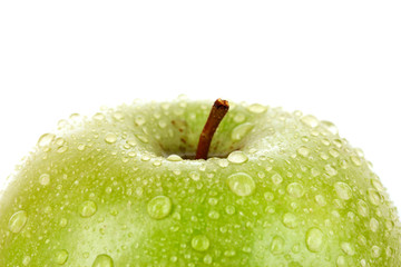 Green apple with water drops isolated on white