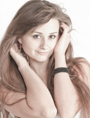 Obraz premium Sensual young woman with beautiful long brown hairs