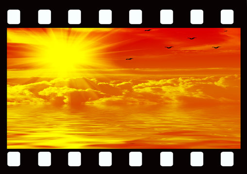 Sunset over the sea in a filmstrip