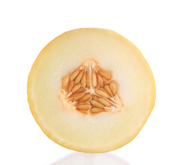 Close-up of melon over white background