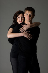 Happy girl hugging a guy