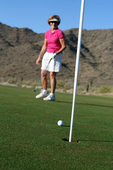 Obraz premium Woman Golfer