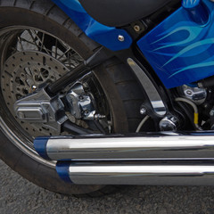 Motorcycle detail wth twin exhausts
