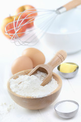 raw ingredientes, ready to merge to make a cake