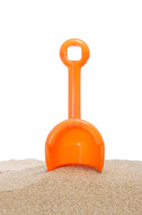 Fototapeta na wymiar beach shovel in the sand