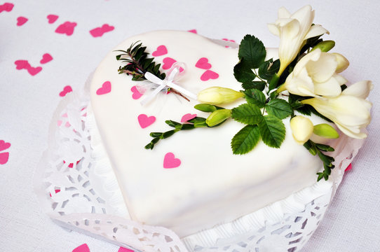 White wedding heart shaped cake