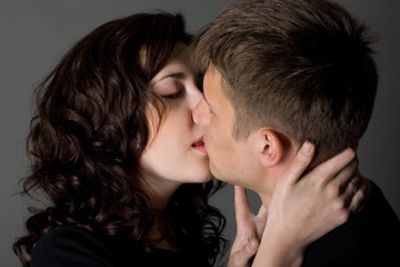 Girl and guy kissing