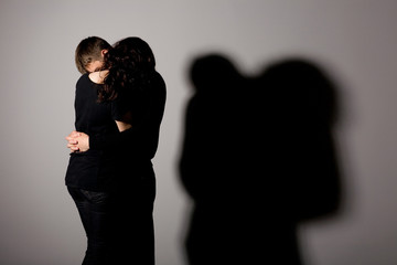 Boy and girl with a shadow