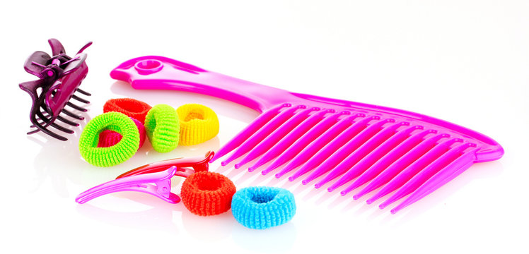 Hairbrush, barrette and Scrunchy isolated on white