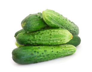 The heap of cucumbers isolated on white background