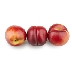Juicy nectarines on a white background