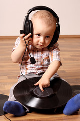 Cute baby dj with disc